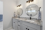 His and hers raised vanities. New counters.