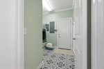 Separate laundry room.