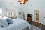 Vaulted ceiling with refreshing fan.