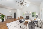Large living room with fireplace - staged