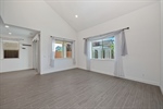2389 Sierra Village Drive Roseville CA 95747 gathering room looking at windows from primary gr23