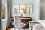Cute nook with stairs leading to the upper level.