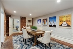 Living room flows seamlessly to the dining room.