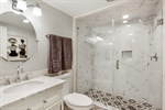 Gorgeous full bath with walk in tiled shower.