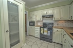 Kitchen with Panty and Load of Cabinets 
