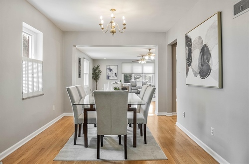 Formal dining opens to living room and family room