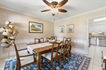 The dining room opens to the kitchen.