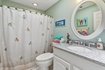 Second full bath with a shower over tub.