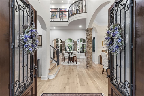 Double wood doors with metal detail