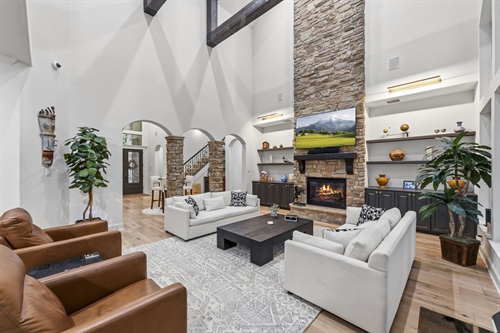 Floor to ceiling fireplace with gas logs