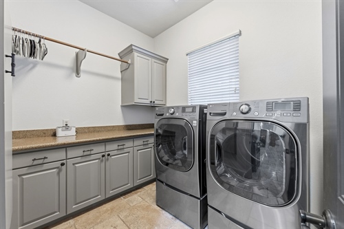 Laundry has folding space iron board