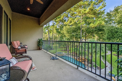 Lanai with backyard views is off game room