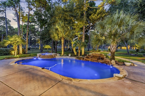 Heated pool spa with waterfall