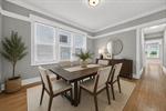 Unit 1 formal dining room virtually staged 