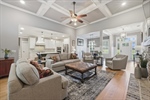Boxed ceiling with lighted fan.