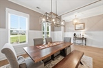 Sophisticated paneling and wide crown moulding.