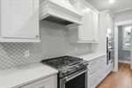 Full tile backsplash.