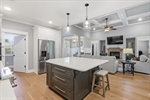 The living room is open to the gorgeous kitchen.