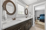 Jack and Jill bath with large double vanity.