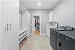 Primary suite with access to the laundry room.