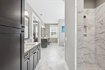 Lots of cabinetry and linen closet.
