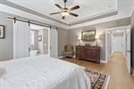 Primary with tray ceiling.