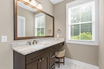Dual vanities with beautiful quartz counters.