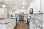 Stunning leathered countertops.