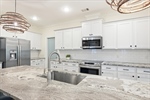 All stainless steel appliances stay with the home.