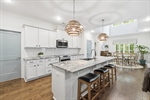 The great room flows into the gorgeous kitchen.