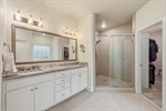 Ensuite with expansive double vanity.