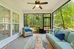 Outside enjoy the screened room.