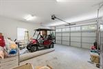 Two car attached garage with opener.