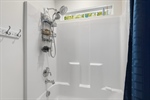 Shower over tub.