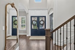 Warm wood flooring and many millwork details