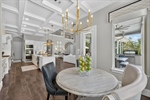 Breakfast room has striking chandelier
