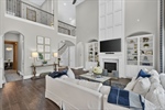 Soaring ceiling adds to airy feeling of den