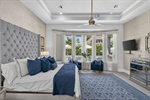 Tray ceiling with recessed lights and ceiling fan