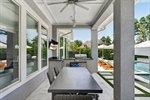 Covered dining space and outdoor kitchen