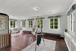 Hardwood Floor and Custom Drapes