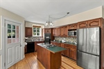 Hardwood Floor and Tile Backsplash