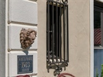 Carved Foliate Mask and House Placque