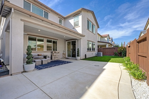 4121 Trinity Alps Way Roseville CA 95747 backyard day from fence corner patio gr57