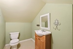 Ensuite half bath for added convenience.