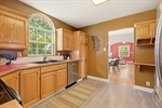 The dining room flows into the kitchen.