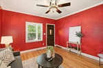 Refreshing lighted ceiling fan and crown moulding.
