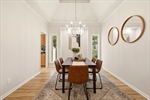 Tray ceiling and lovely windows.