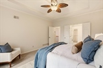 Refreshing lighted ceiling fan and tray ceiling.