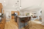 Expansive island with bar seating.