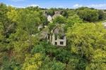 The home is tucked away on a treed cul de sac.